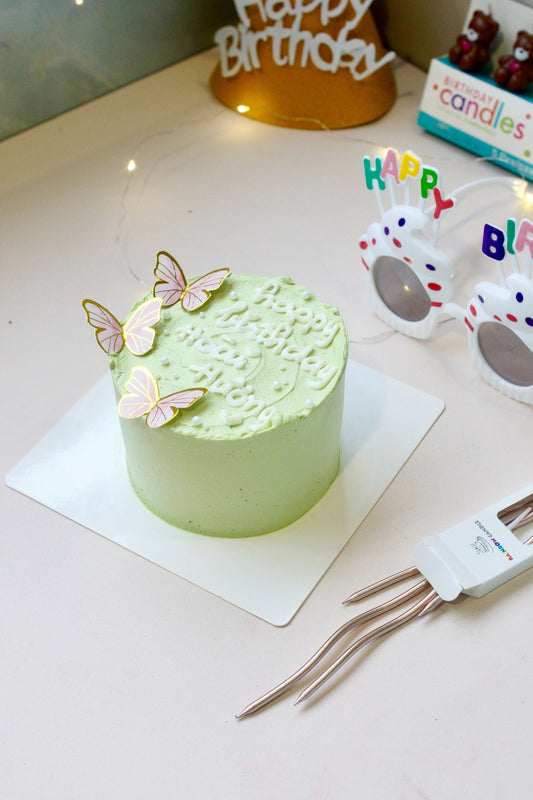 Butterfly themed party with colorful wing decorations and butterfly party supplies