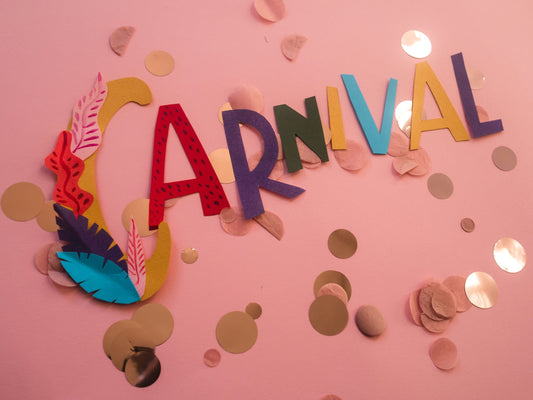 Carnival themed party with colorful decorations, masks, and festive carnival party supplies