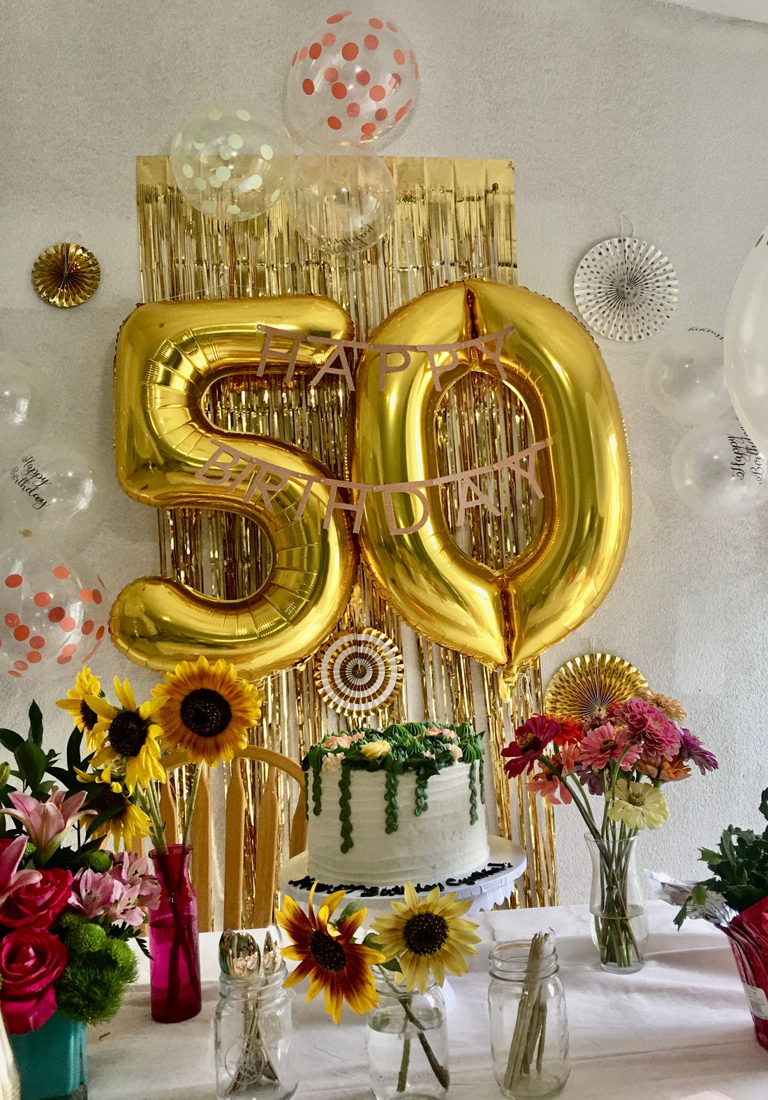 Golden birthday party with gold balloons, shimmering decor, and golden party supplies