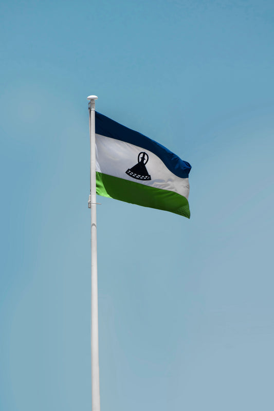 Lesotho independence day party with national flag decorations, patriotic tableware, and themed party supplies