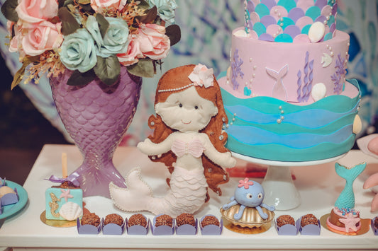 Mermaid themed party with ocean decorations, scales, and mermaid party supplies