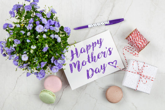 Mother's Day party with floral decorations, brunch tableware, and Mother's Day party supplies
