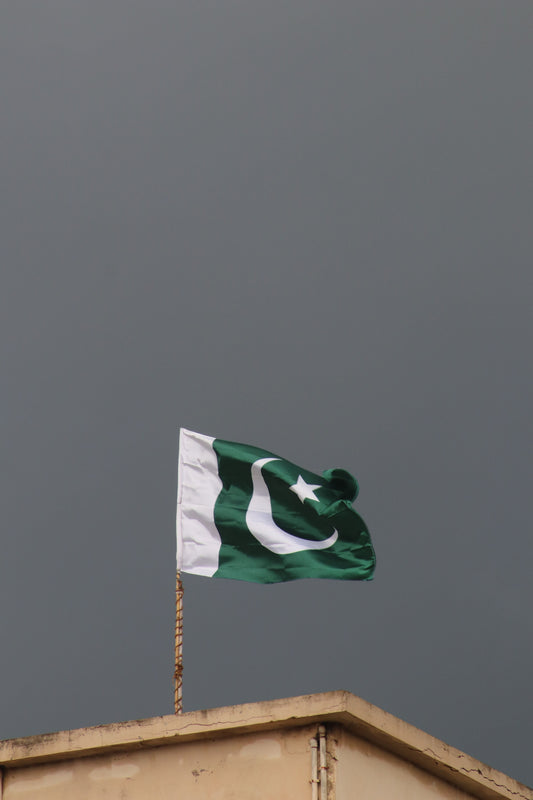 Pakistan independence day party with national flag decorations, patriotic tableware, and themed party supplies