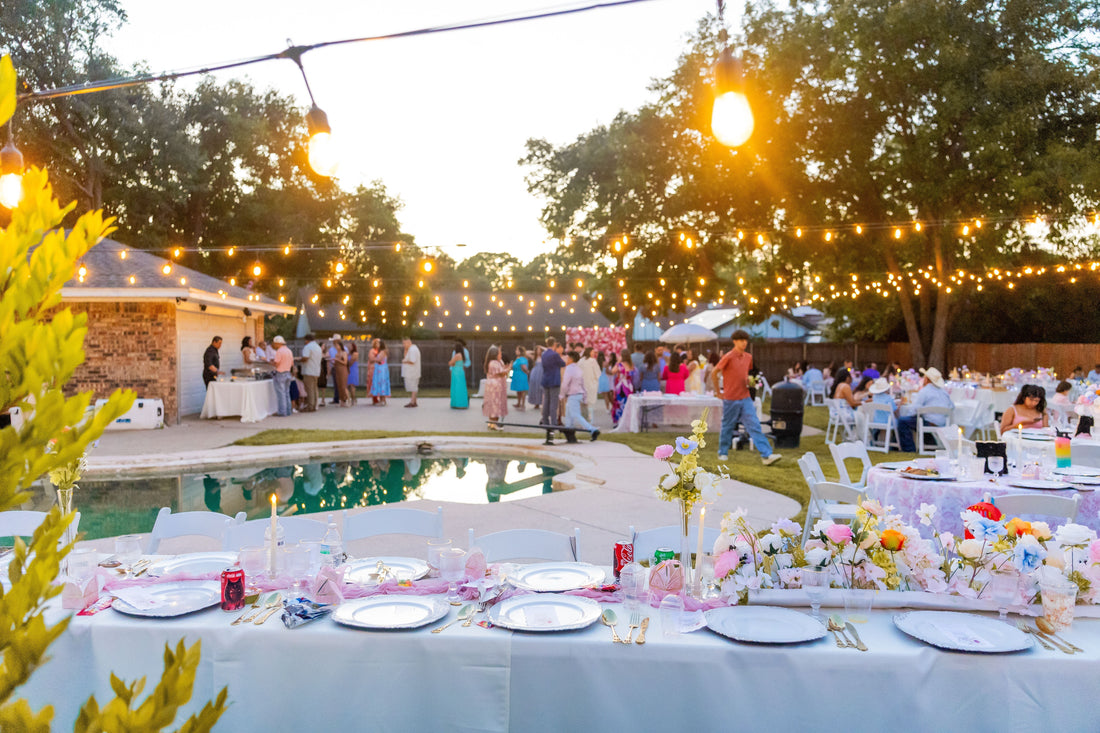 Pool party with float decorations, tropical tableware, and pool party supplies
