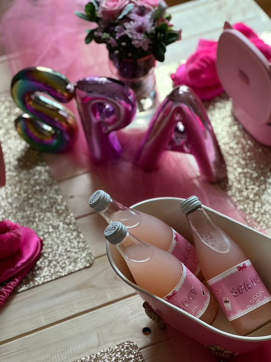 Spa party with face masks, towels, and relaxing spa party supplies