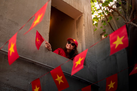 Vietnam National Day party with national flag decorations, patriotic tableware, and themed party supplies