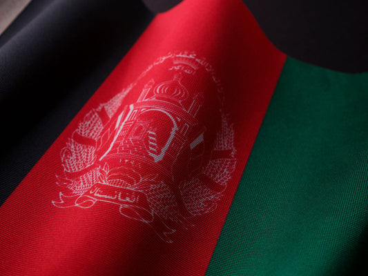 Afghanistan independence day party with national flag decorations, patriotic tableware, and themed party supplies