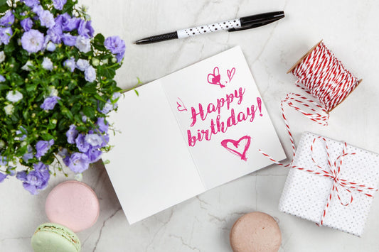 80th birthday party celebration with balloons, banners, and themed tableware and decorations
