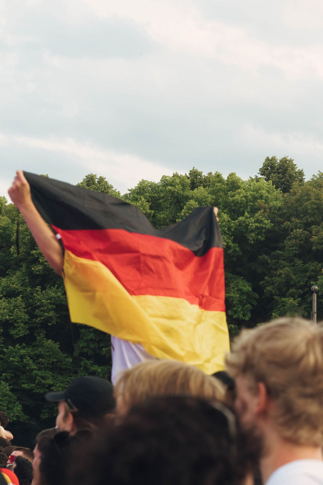 Germany Unity Day party with black red gold flag decorations, German tableware, and themed party supplies
