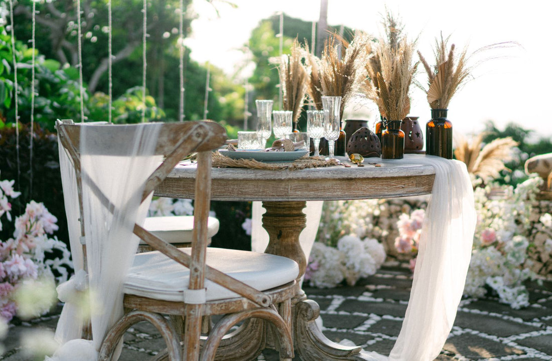 Boho party with macrame decor, dried florals, and bohemian party supplies