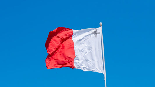Malta independence day party with national flag decorations, patriotic tableware, and themed party supplies