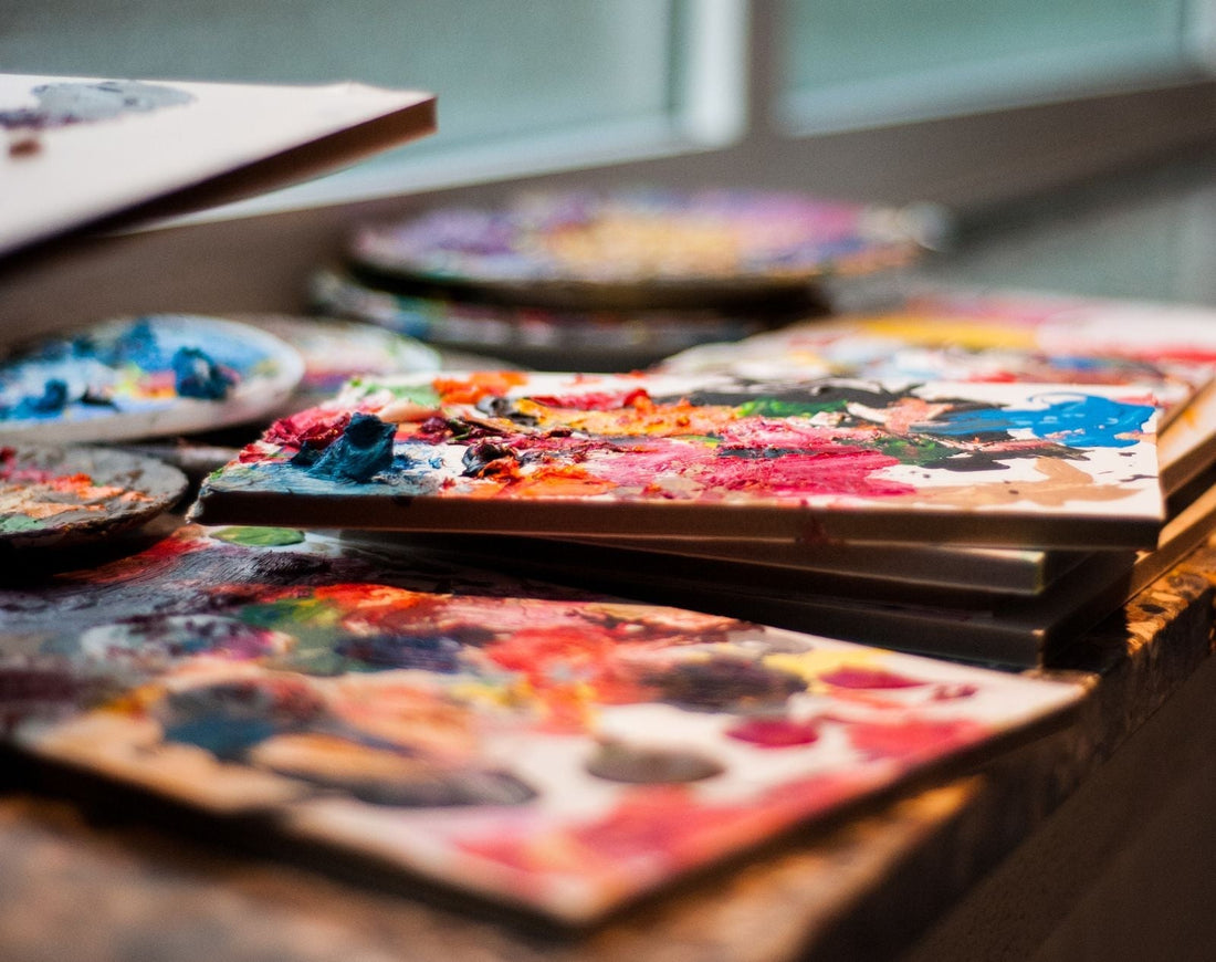 Art painting party with easels, paint palettes, and colorful art party supplies