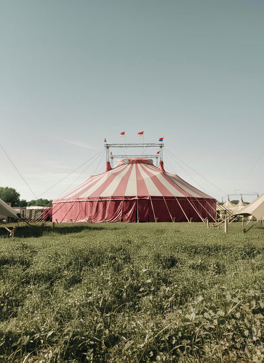 Circus party with big top decorations, popcorn, and carnival party supplies
