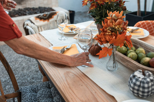 Fall harvest party with autumn decorations, pumpkins, and harvest party supplies