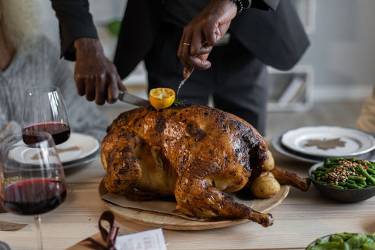 Thanksgiving party with harvest decorations, pumpkins, and Thanksgiving party supplies