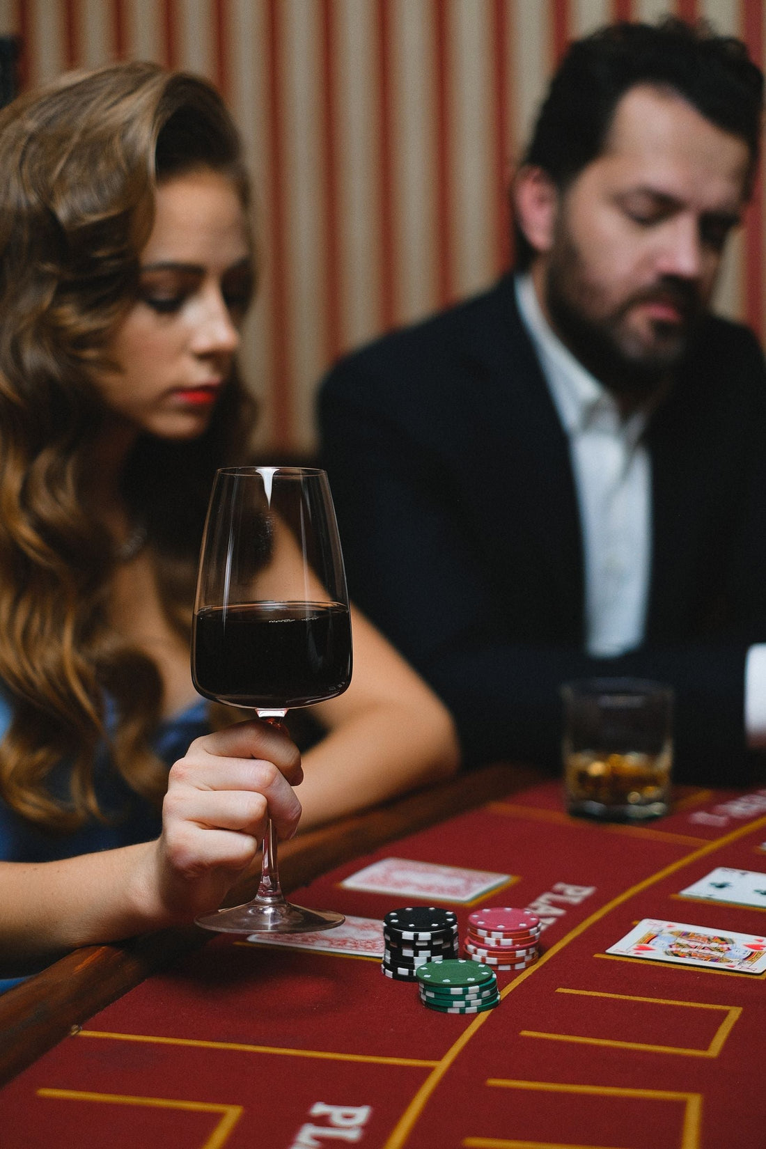 Casino night party with playing card decor, poker chips, and casino party supplies