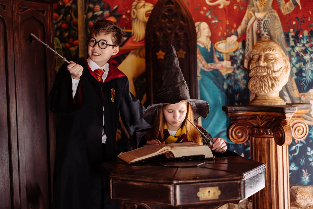 Wizarding themed party with spellbook decor, wands, and Harry Potter party supplies