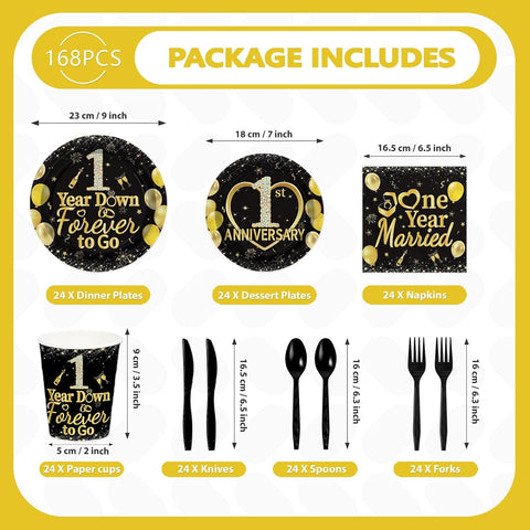 Full set of black gold anniversary plates napkins cups cutlery flat lay