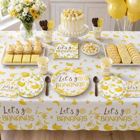 Banana birthday party table with yellow fruit tableware
