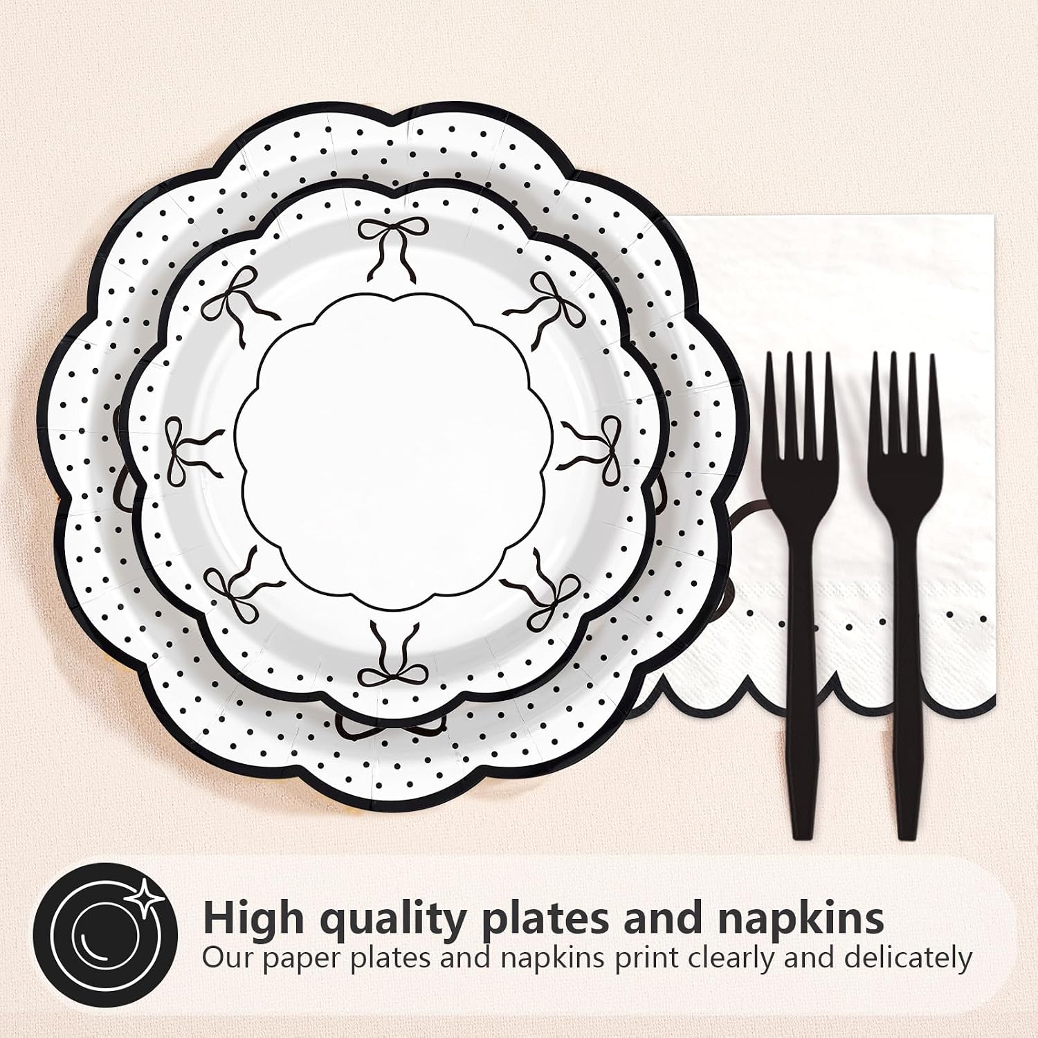Scalloped black bow dinner plate with polka dots and forks