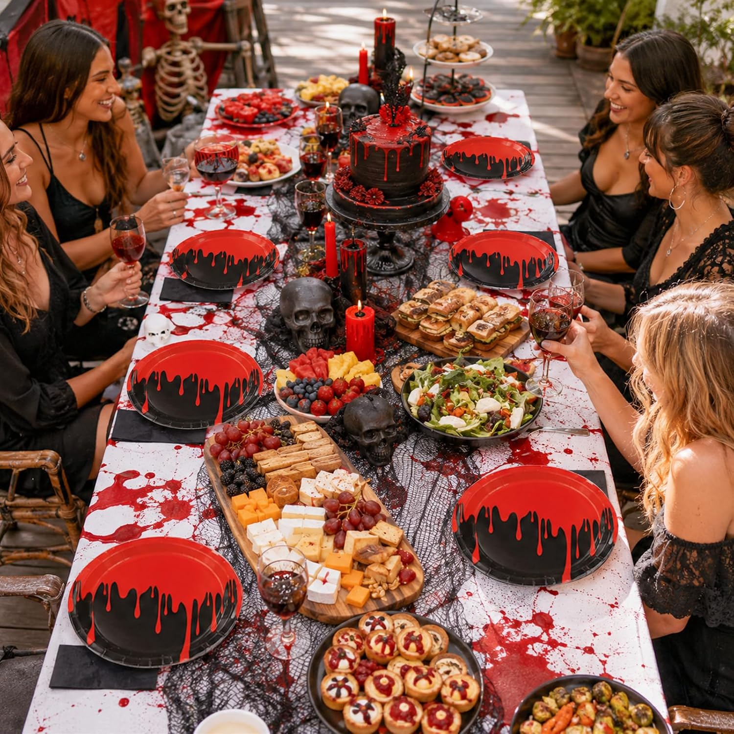 Blood drip Halloween dinnerware arranged for a horror themed party