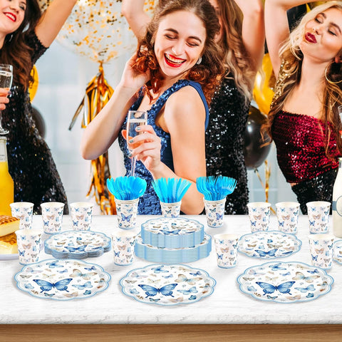Blue butterfly tableware set arranged for a girl butterfly theme birthday