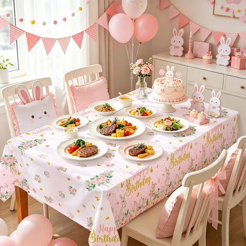 Girls birthday party scene with pink bunny themed tablecloth