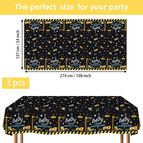 Dump truck construction baby shower plastic tablecloth with yellow and black caution tape border