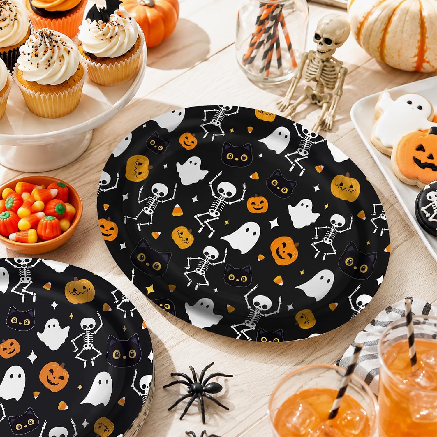 Dessert table with the ghost pumpkin oval plates and cupcakes