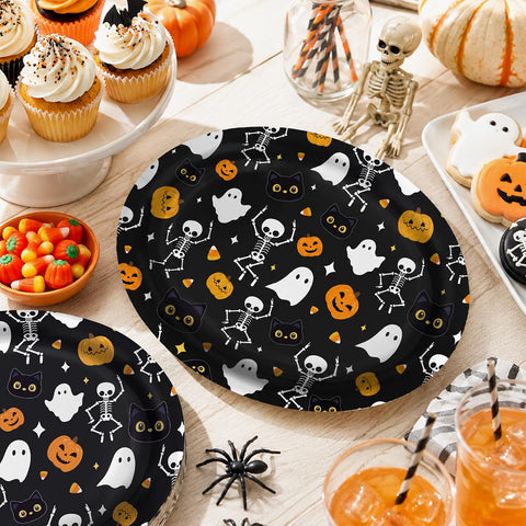 Dessert table with the ghost pumpkin oval plates and cupcakes