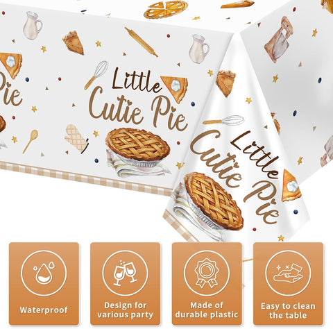 Flat lay of three cutie pie baby shower tablecloths with pie and baking tools watercolor pattern
