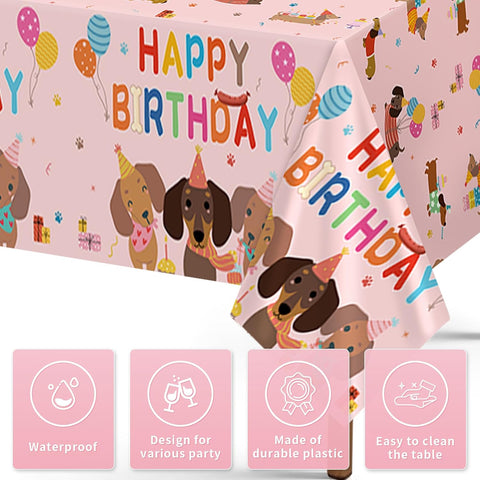 Close-up of dachshund birthday plastic tablecloth with wiener dogs, balloons and Happy Birthday lettering