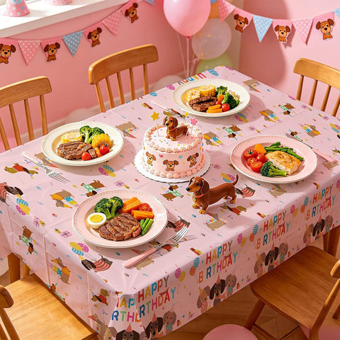 Dog themed birthday party scene with pink dachshund tablecloth