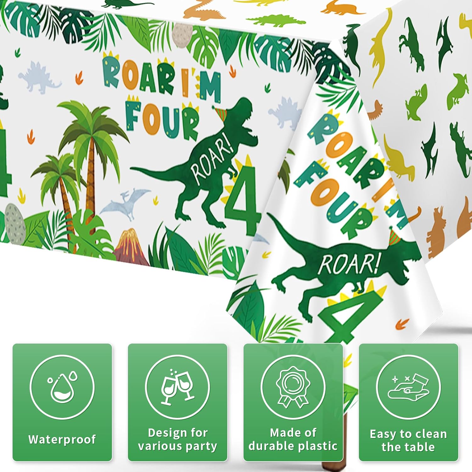 Close-up of dinosaur 4th birthday plastic tablecloth with FOUR REX and ROAR lettering