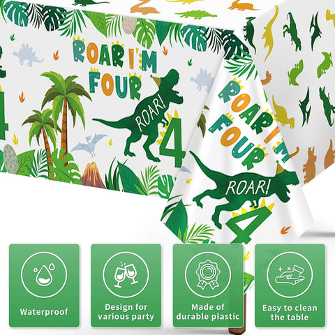 Close-up of dinosaur 4th birthday plastic tablecloth with FOUR REX and ROAR lettering