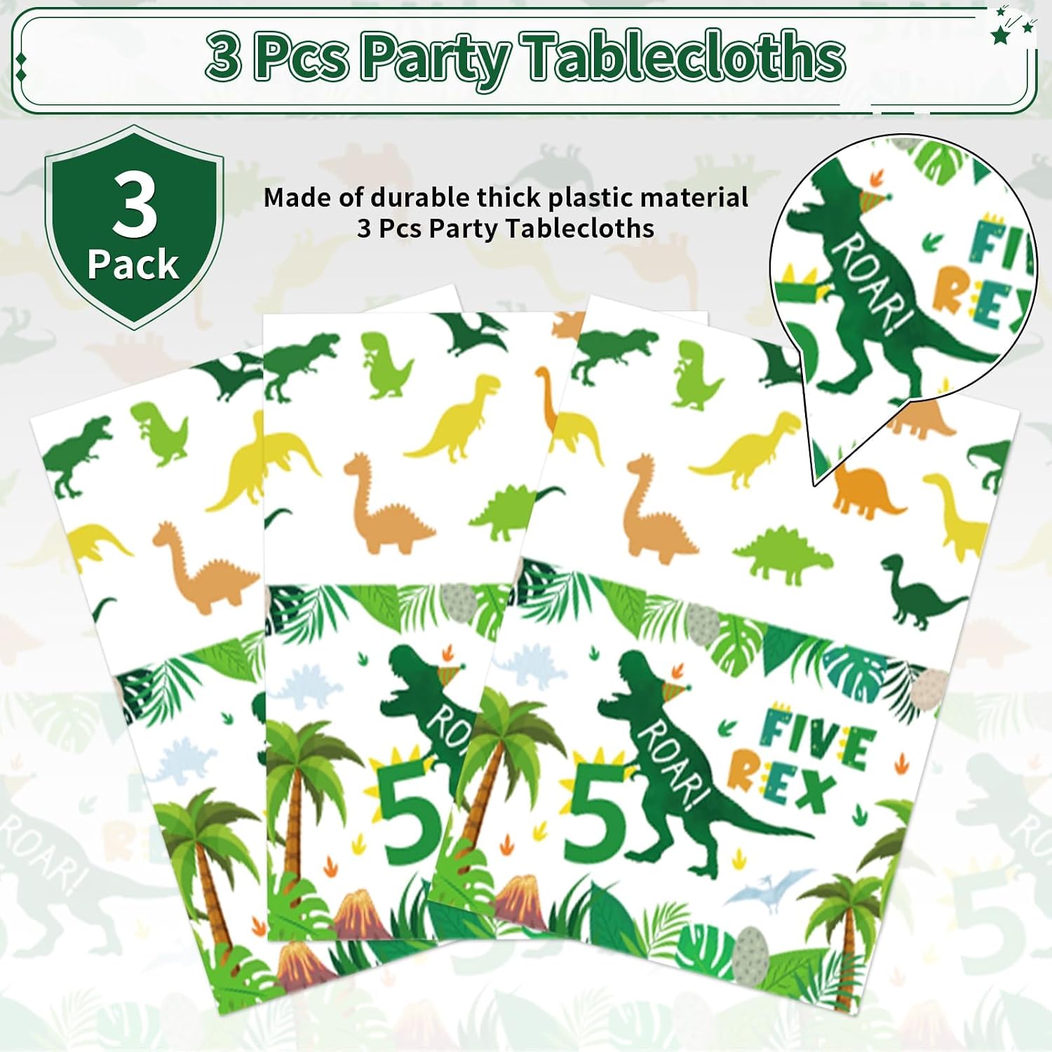 Dinosaur 5th birthday tablecloth draped on party table with dino themed decorations