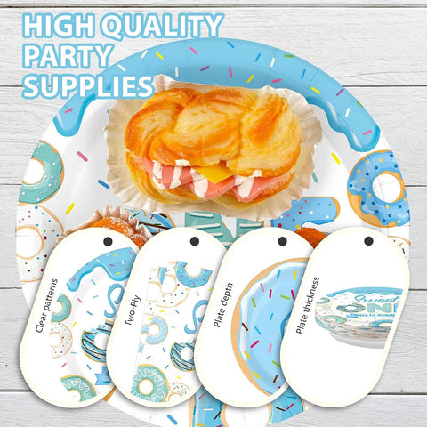 Baby boy one year old party table with blue donut tableware