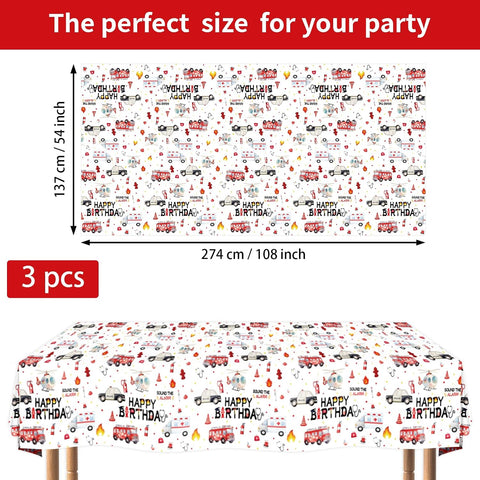 Flat lay of three emergency vehicle birthday tablecloths with rescue vehicle graphics