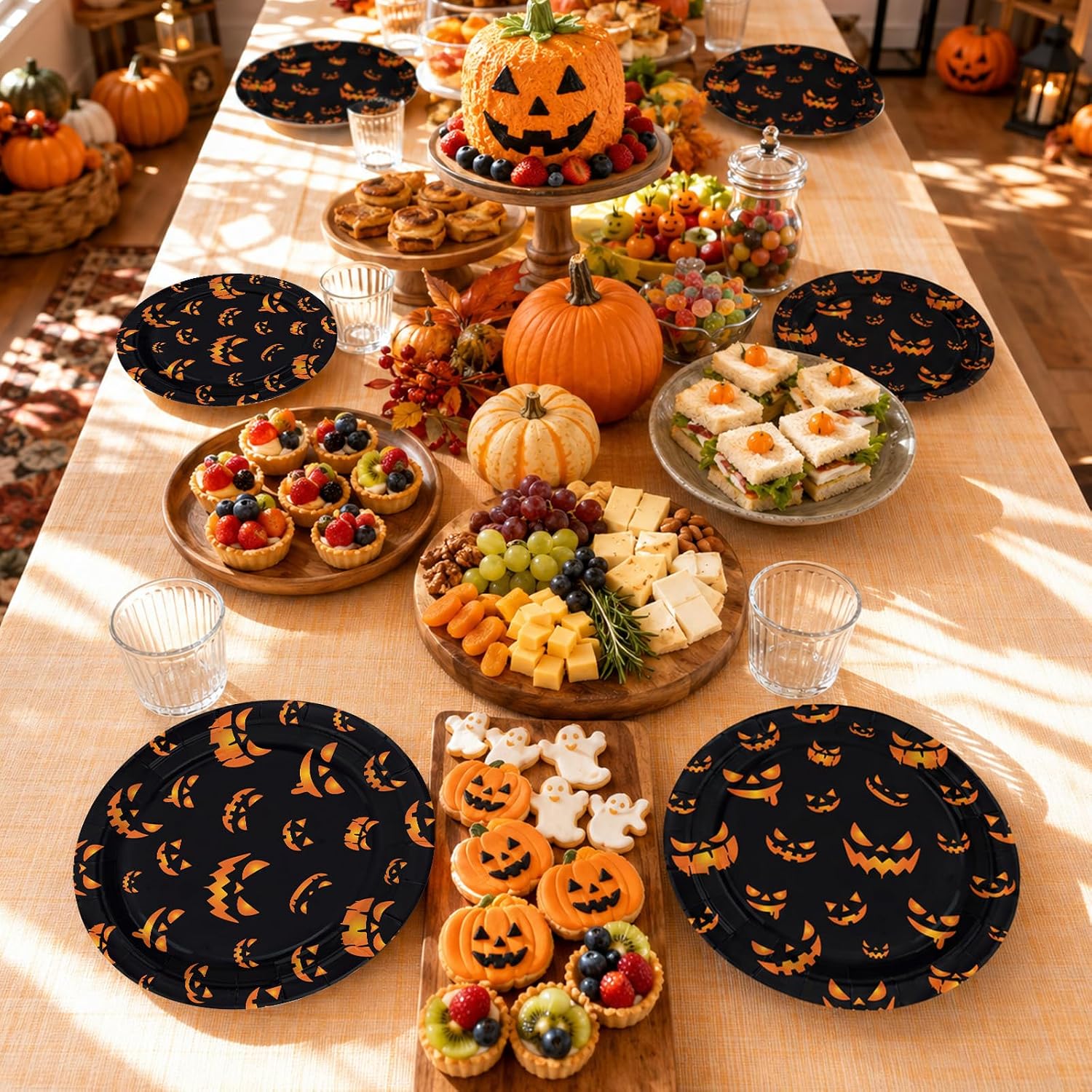 Nine inch Halloween dessert plates with assorted jack o lantern grins