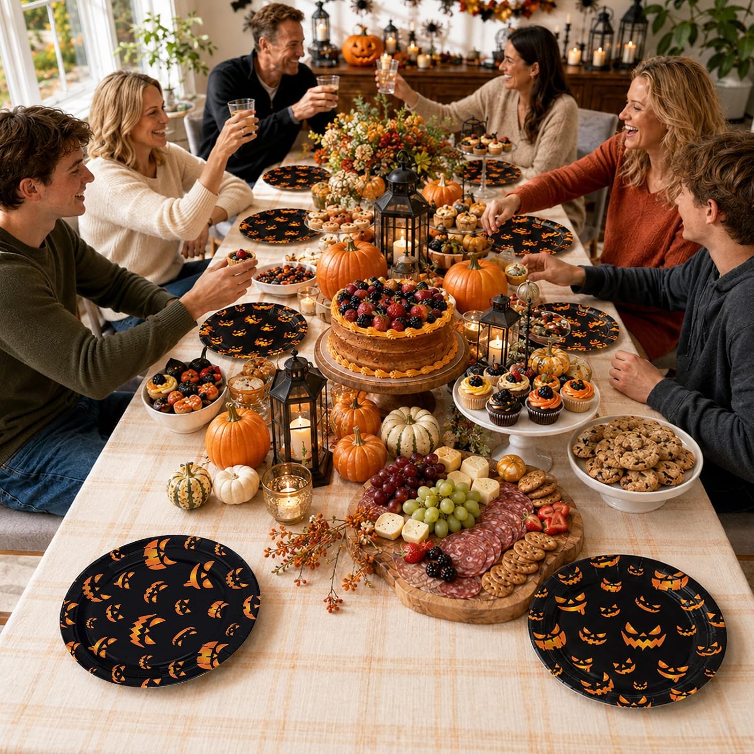 Evil pumpkin Halloween tableware arranged for a fall celebration