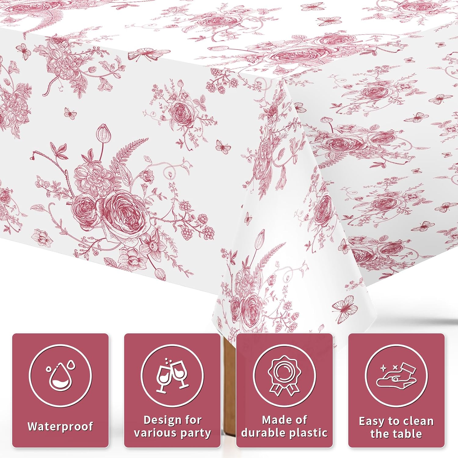 Close-up of pink floral plastic tablecloth with vintage flowers
