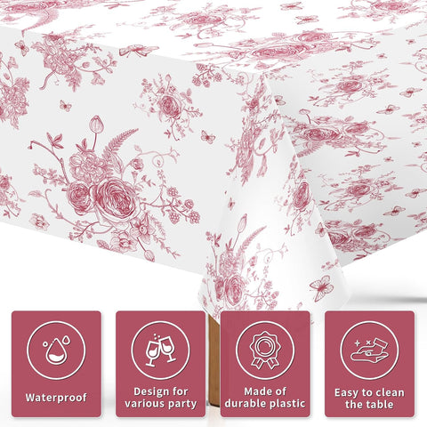Close-up of pink floral plastic tablecloth with vintage flowers