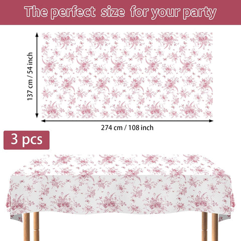 Flat lay of three pink floral tablecloths with garden pattern