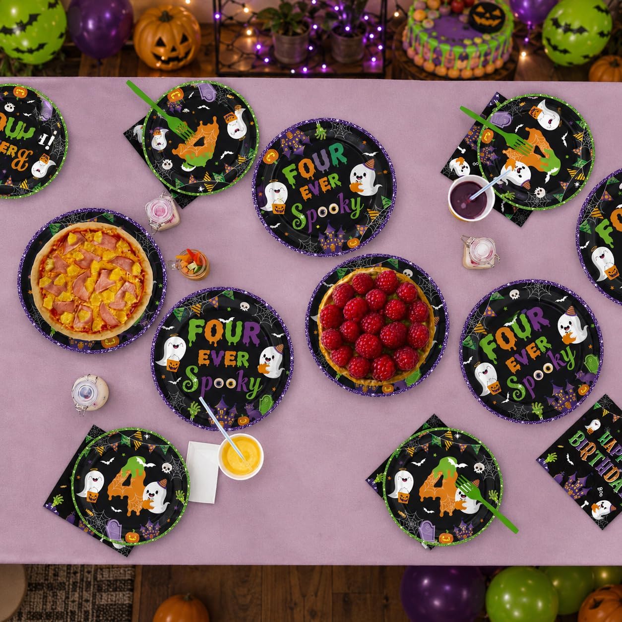 Halloween birthday table styled with the ghost set