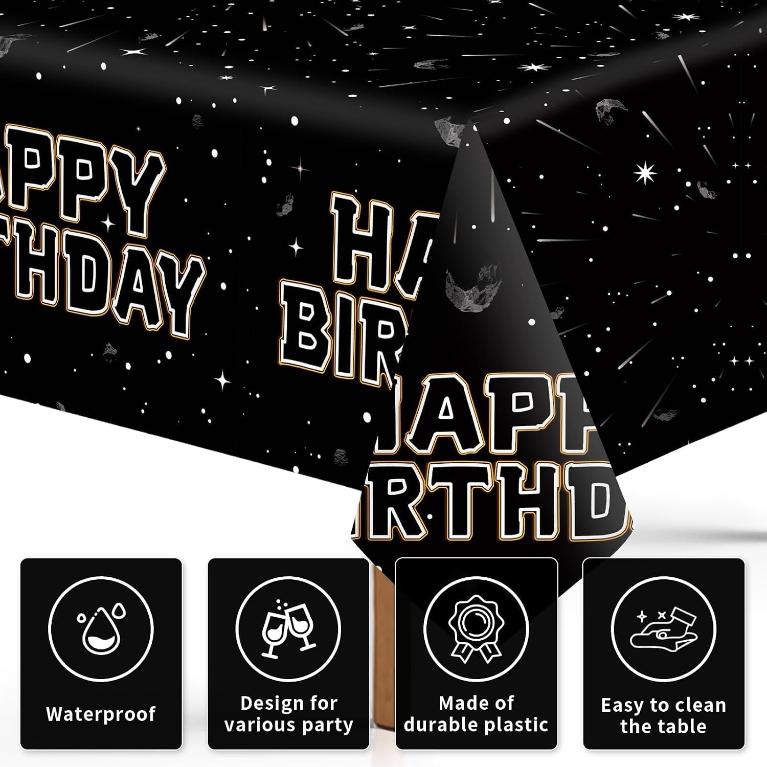 Close-up of black galaxy plastic tablecloth with stars