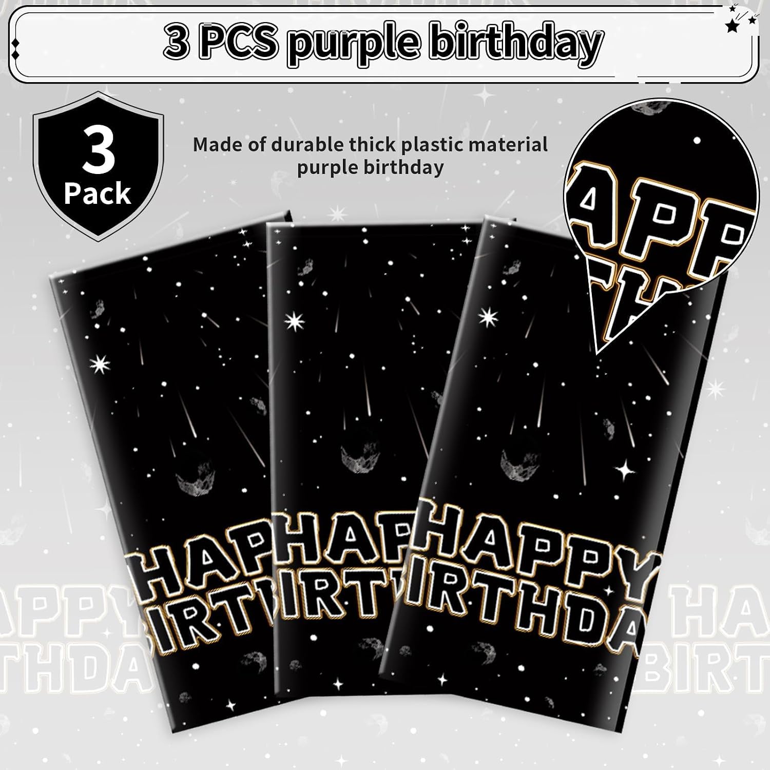 Galaxy tablecloth draped on party table with space themed decorations