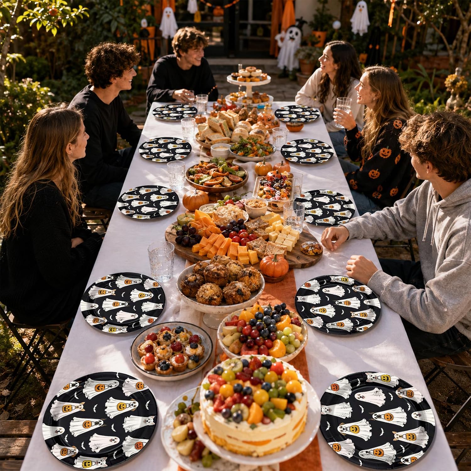 Party table styled with the black ghost dog plates