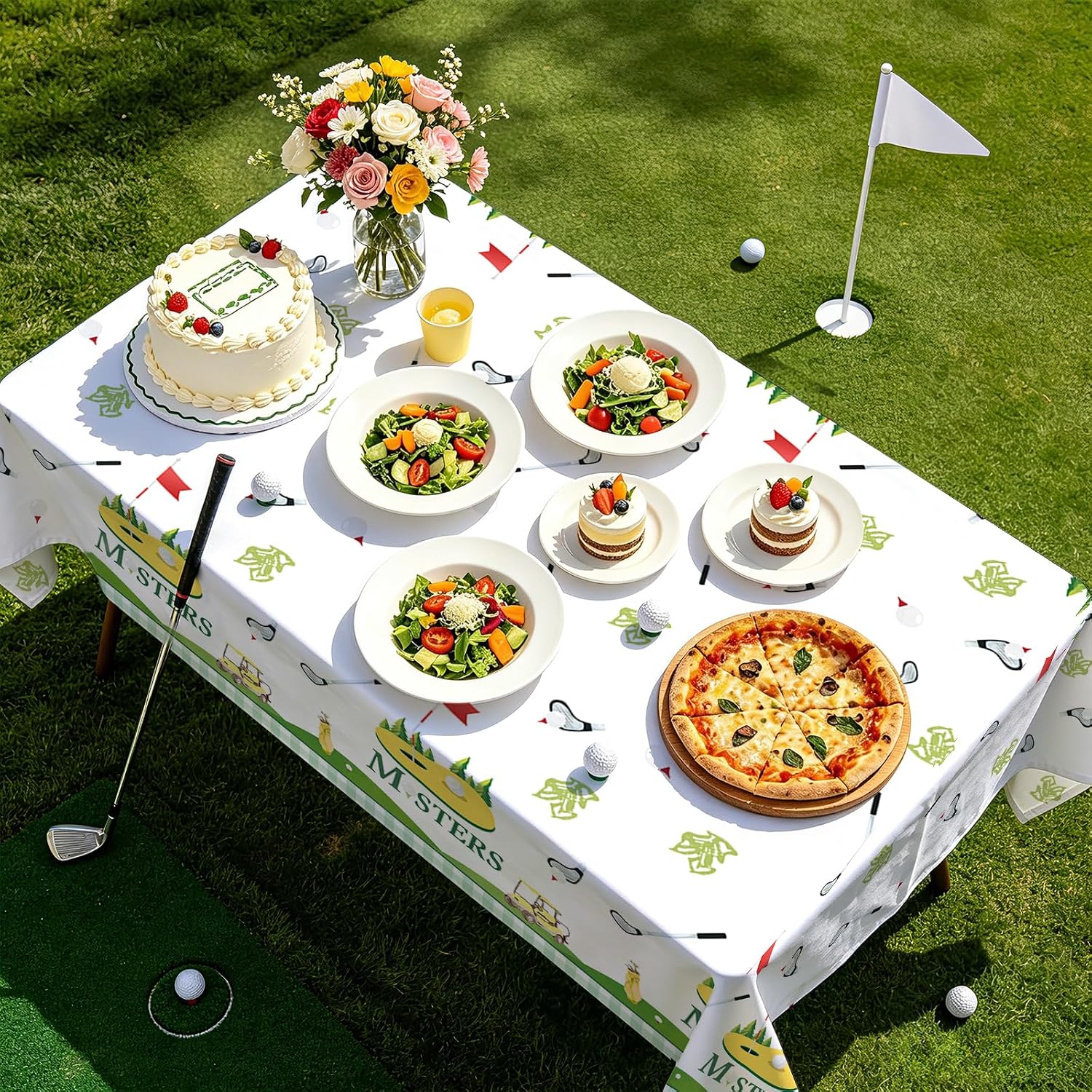 Boys first golf birthday party scene with sports themed tablecloth