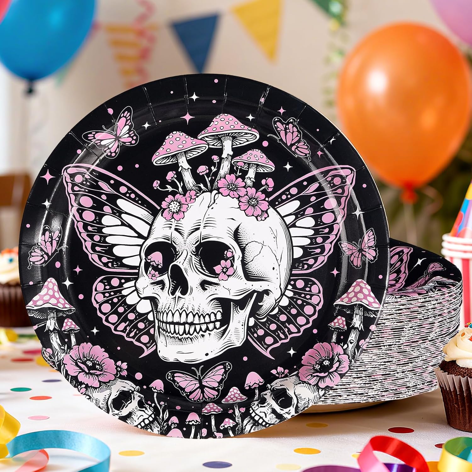 Stack of skeleton butterfly party plates