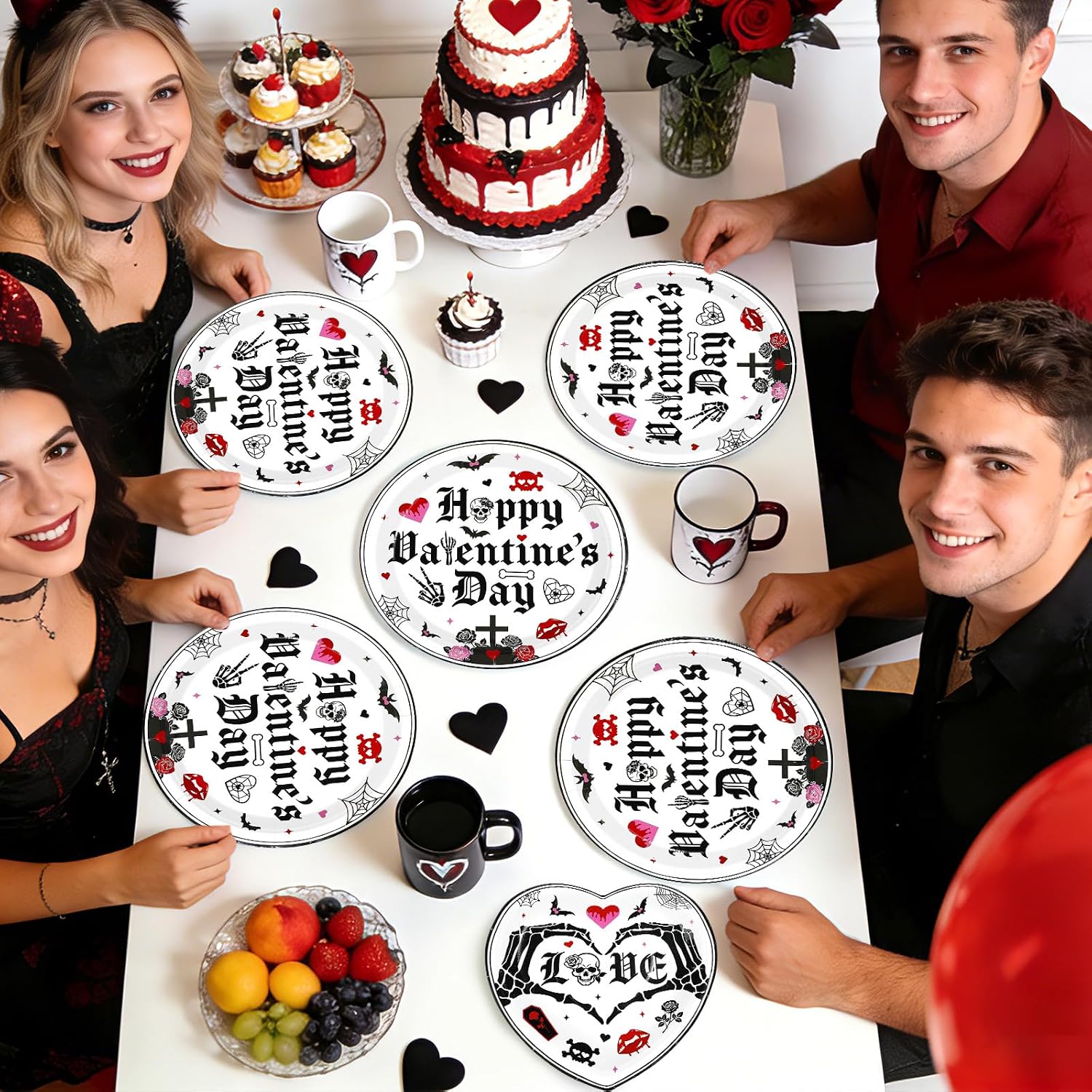 Guests celebrating with the gothic heart plates and napkins